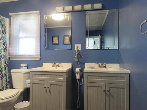 Top floor master bath w/ his and her sink's and hair dryer 