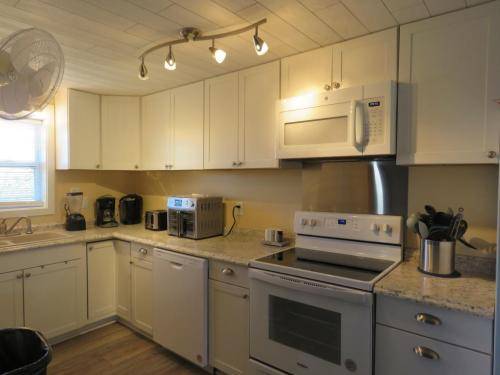 Fully stocked kitchen with 2 kinds of coffee maker's, an air dryer, and so much more